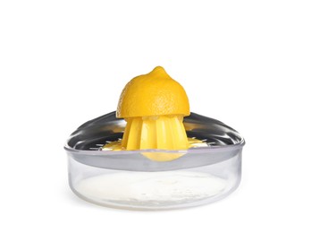Photo of Metal juicer with half of lemon on white background