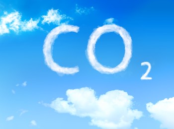 CO2 emissions. View of blue sky with white clouds