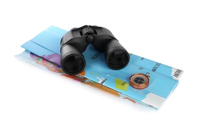 Photo of Modern binoculars, compass and map on white background