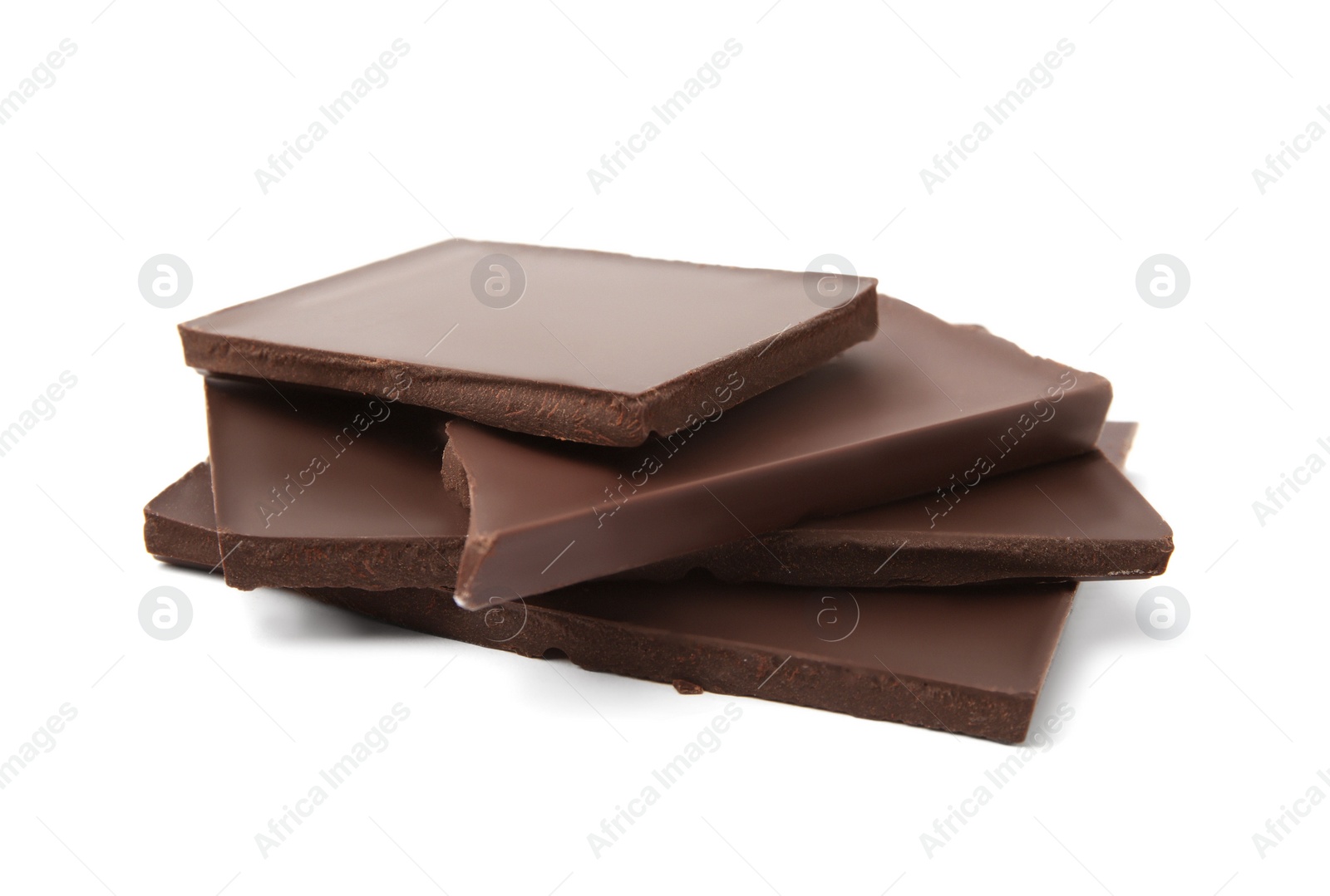 Photo of Pieces of tasty dark chocolate bar on isolated white