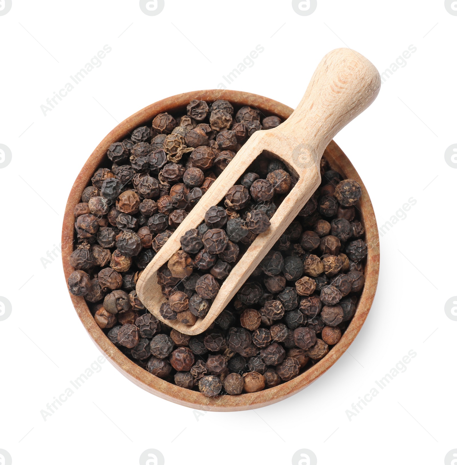 Photo of Aromatic spice. Many black peppercorns in bowl and scoop isolated on white, top view