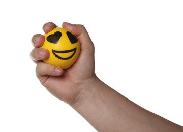 Man squeezing yellow stress ball on white background, closeup