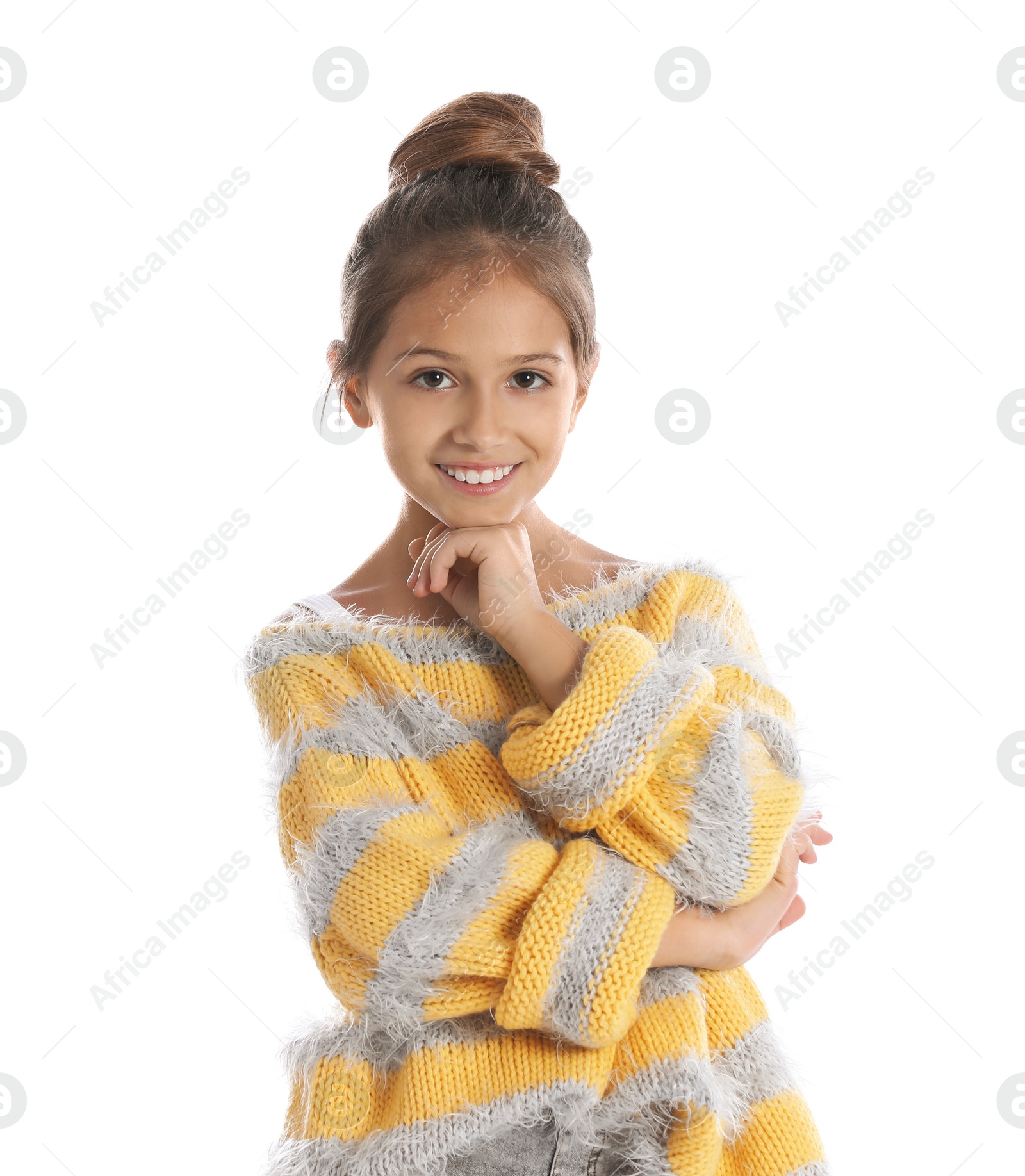 Photo of Pretty preteen girl posing against white background