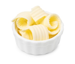 Tasty butter curls in bowl isolated on white