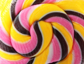 Tasty colorful fruit flavored candy as background, closeup
