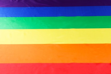 Photo of Rainbow LGBT flag as background, top view