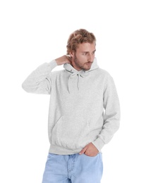 Portrait of man in hoodie sweater on white background. Space for design