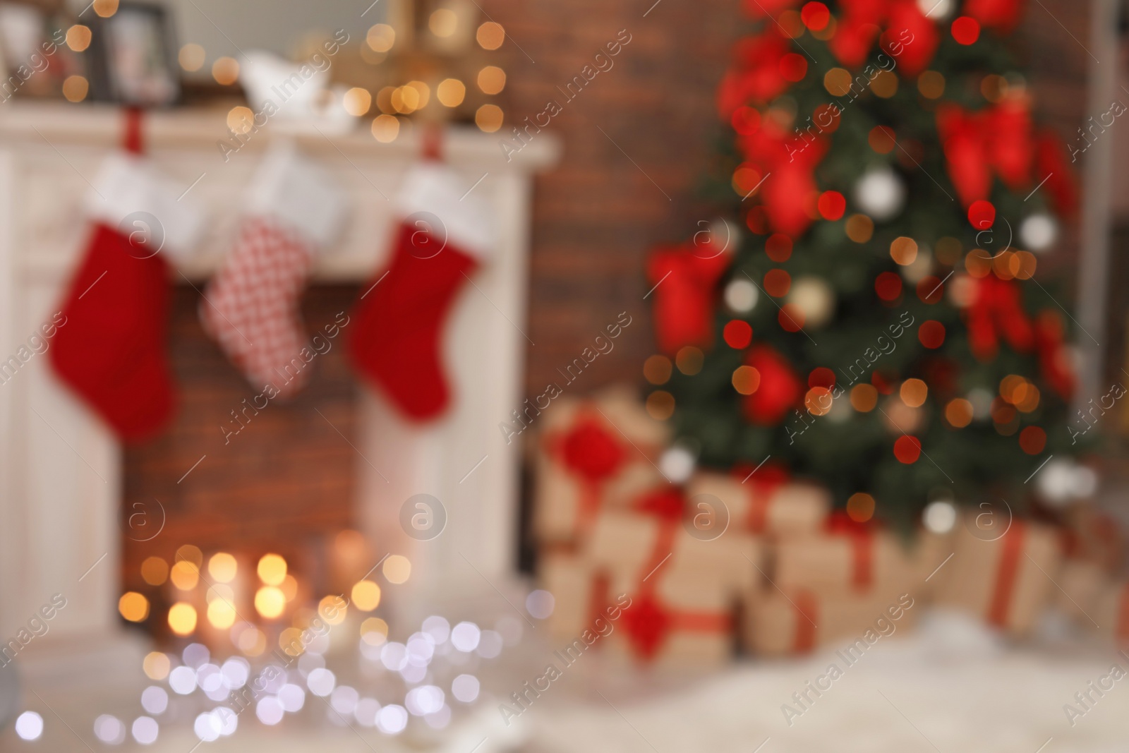 Photo of Blurred view of room with beautiful Christmas tree