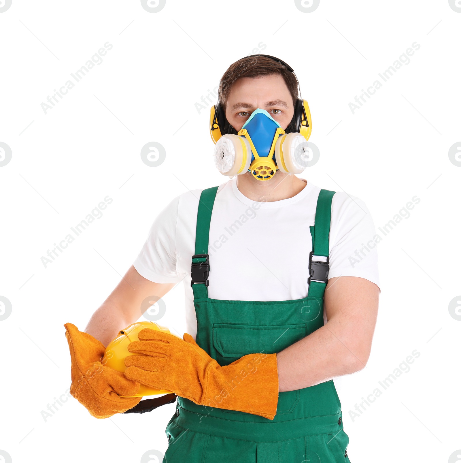 Photo of Male industrial worker in uniform on white background. Safety equipment