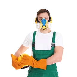 Male industrial worker in uniform on white background. Safety equipment