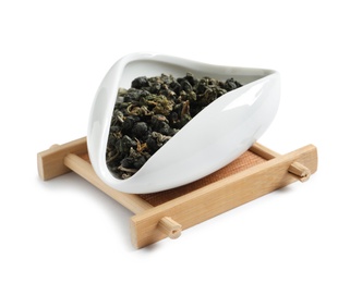 Photo of Bowl with Ali Shan Oolong tea on white background