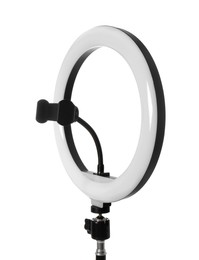 Photo of Modern ring light on stand against white background