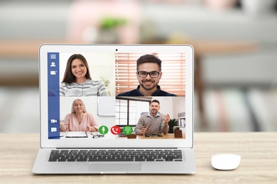 Team of coworkers having video chat on laptop screen, views from camera