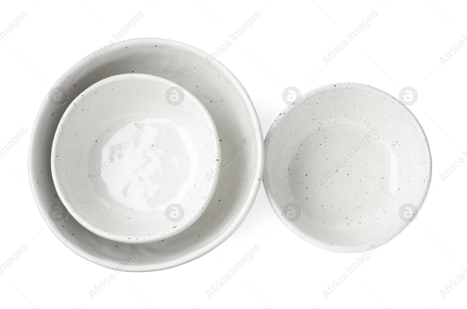 Photo of Beautiful empty ceramic bowls on white background, top view