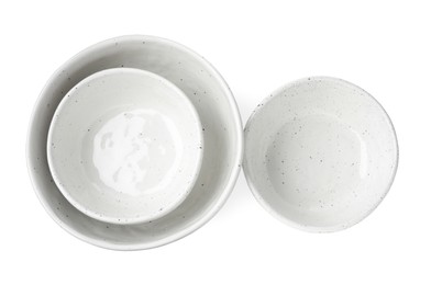 Photo of Beautiful empty ceramic bowls on white background, top view