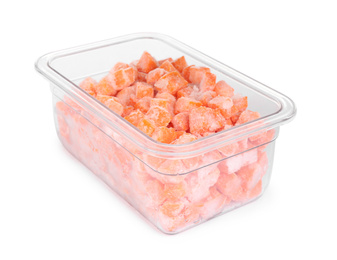 Photo of Frozen carrots in plastic container isolated on white. Vegetable preservation