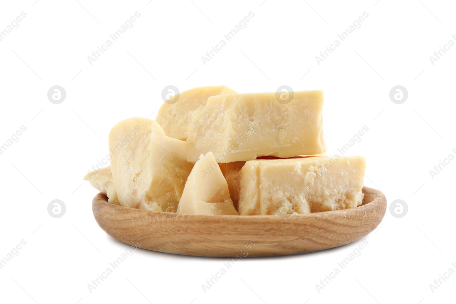 Photo of Aromatic organic cocoa butter in wooden bowl isolated on white