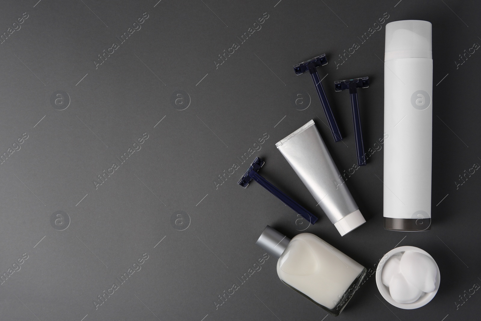 Photo of Flat lay composition with shaving accessories for men on grey background. Space for text