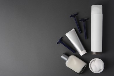 Flat lay composition with shaving accessories for men on grey background. Space for text