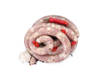 Homemade sausage, garlic, chili and peppercorns isolated on white, above view