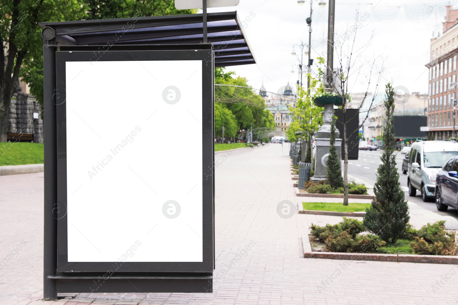 Photo of Blank advertising board on bus stop. Space for design