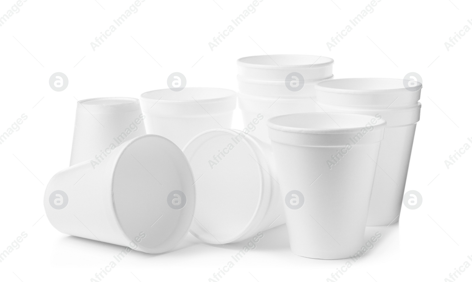 Photo of Many clean styrofoam cups on white background