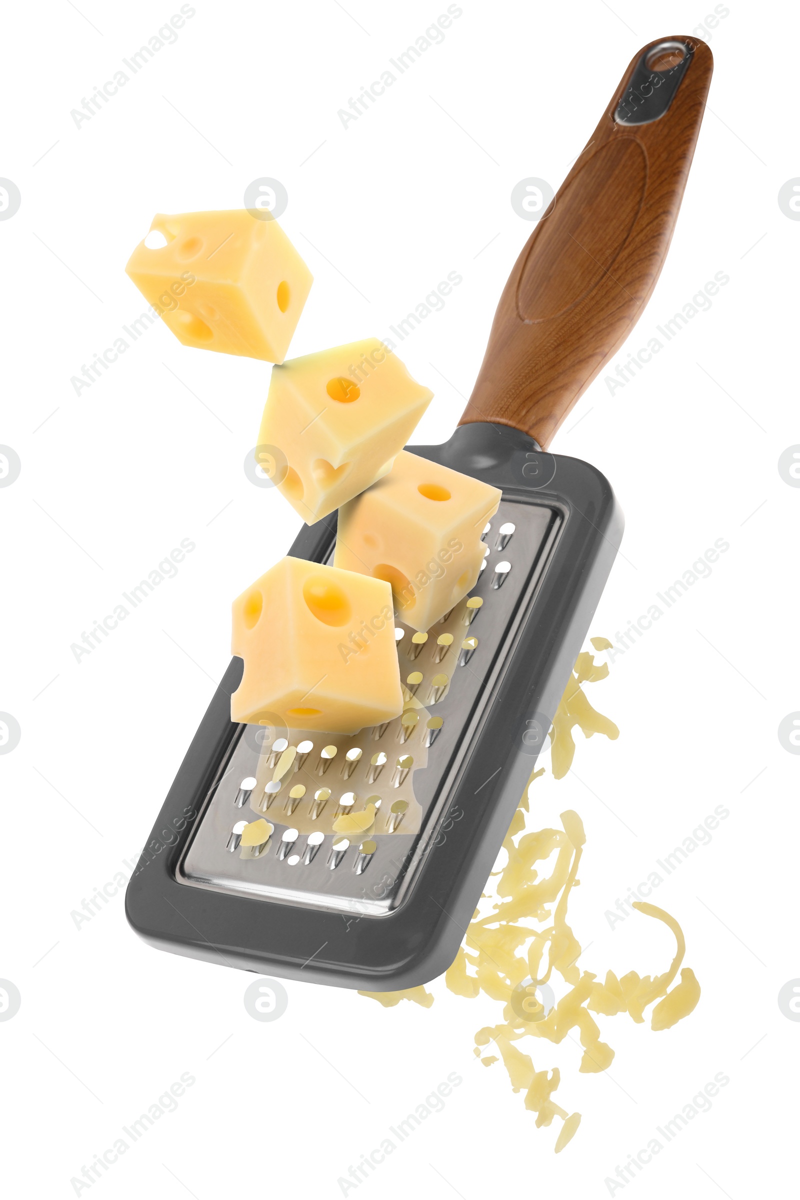 Image of Grating cheese with hand grater in air on white background