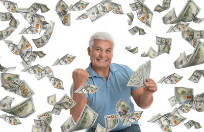 Emotional senior man with American dollars under money rain on white background 