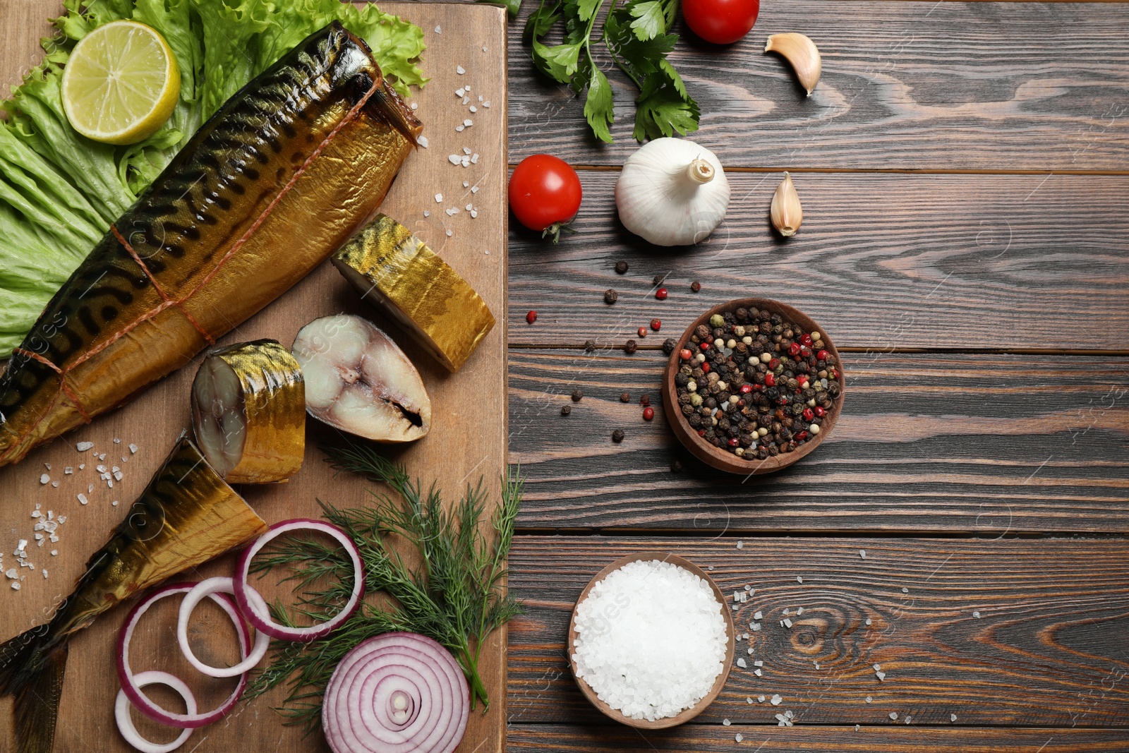 Photo of Flat lay composition with smoked fish on wooden table