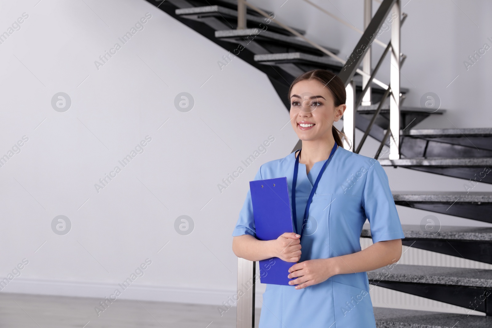 Photo of Portrait of young nurse in hospital. Medical assistant