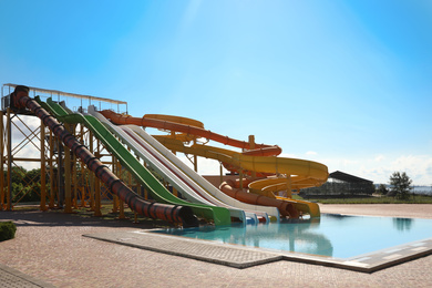 Photo of Water park with colorful slides. Summer vacation