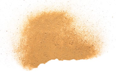 Photo of Pile of brown dust scattered on white background, top view
