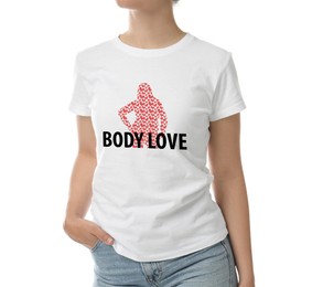Woman in t-shirt with words Body Love and female figure made of hearts on white background, closeup
