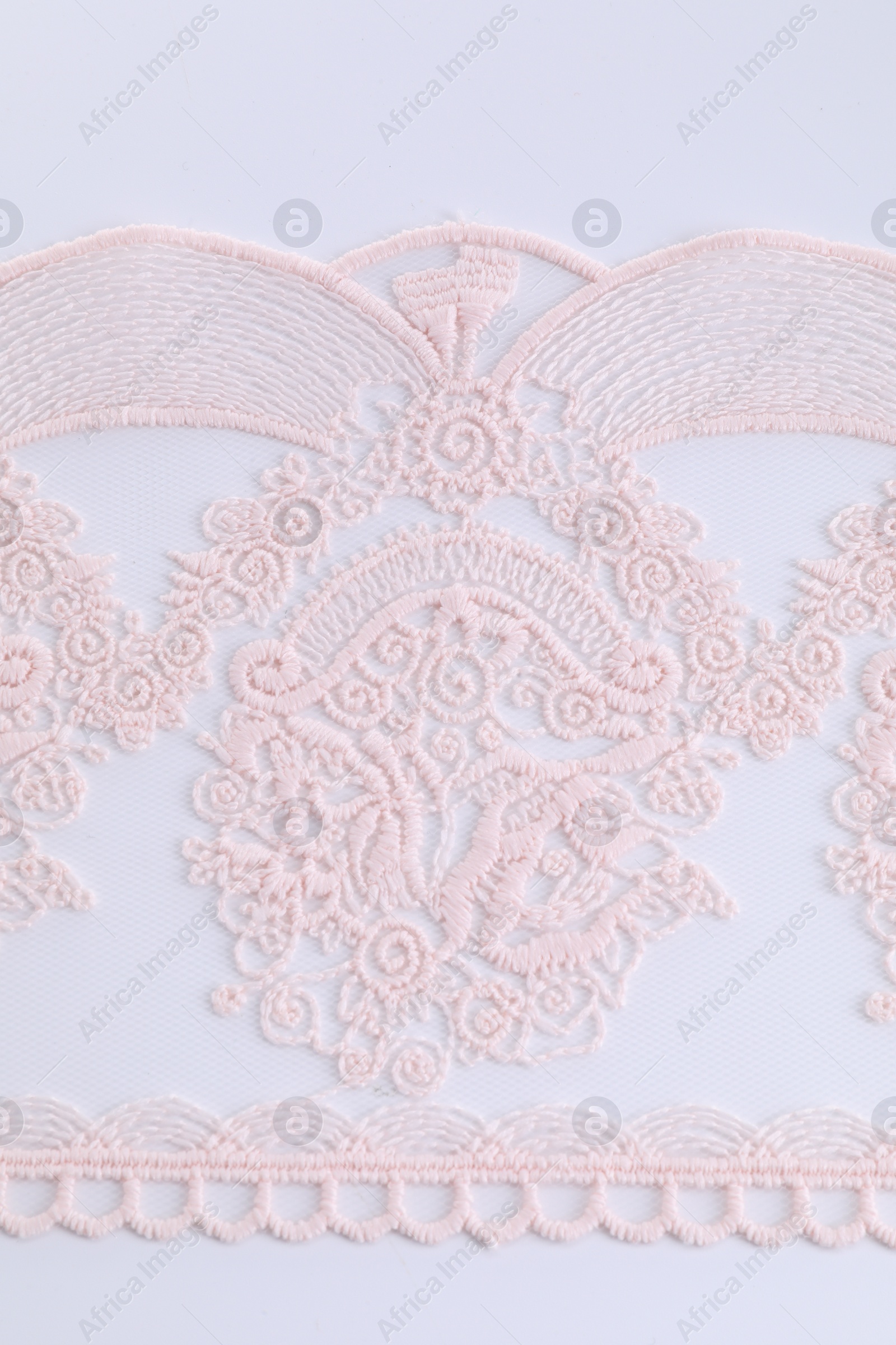 Photo of Beautiful lace on white background, top view