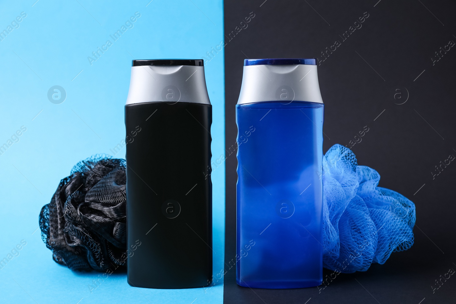 Photo of Bottles with shower gel and bast wisps on color background. Men's cosmetics