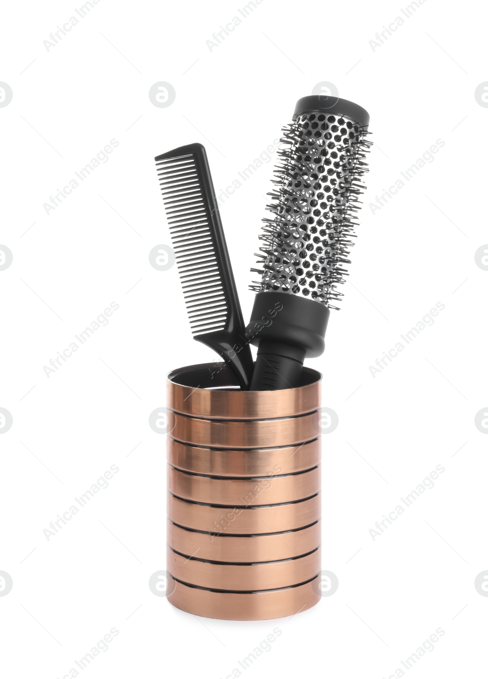 Photo of Modern hair brush and comb in holder isolated on white