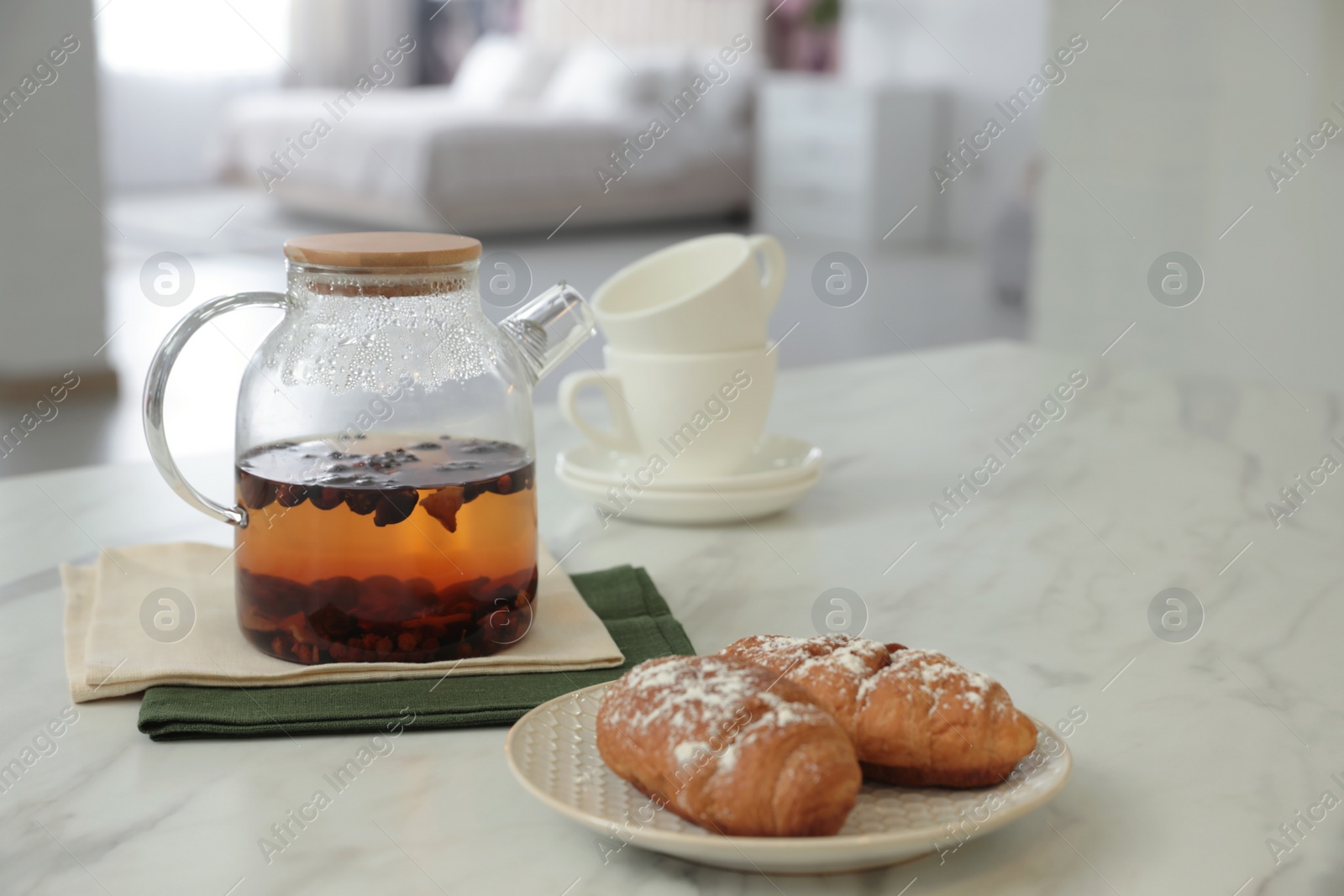 Photo of Breakfast served on table in modern kitchen