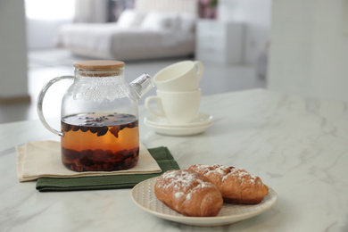 Breakfast served on table in modern kitchen