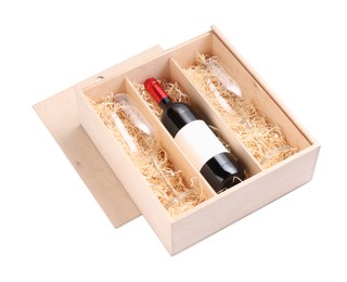 Photo of Wooden gift box with bottle of wine and glasses isolated on white