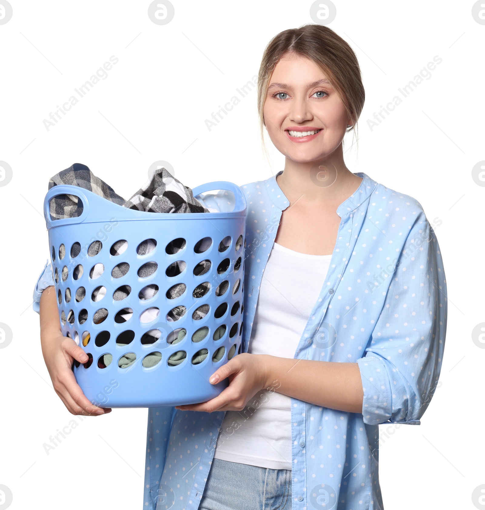 Photo of Happy woman with basket full of laundry on white background