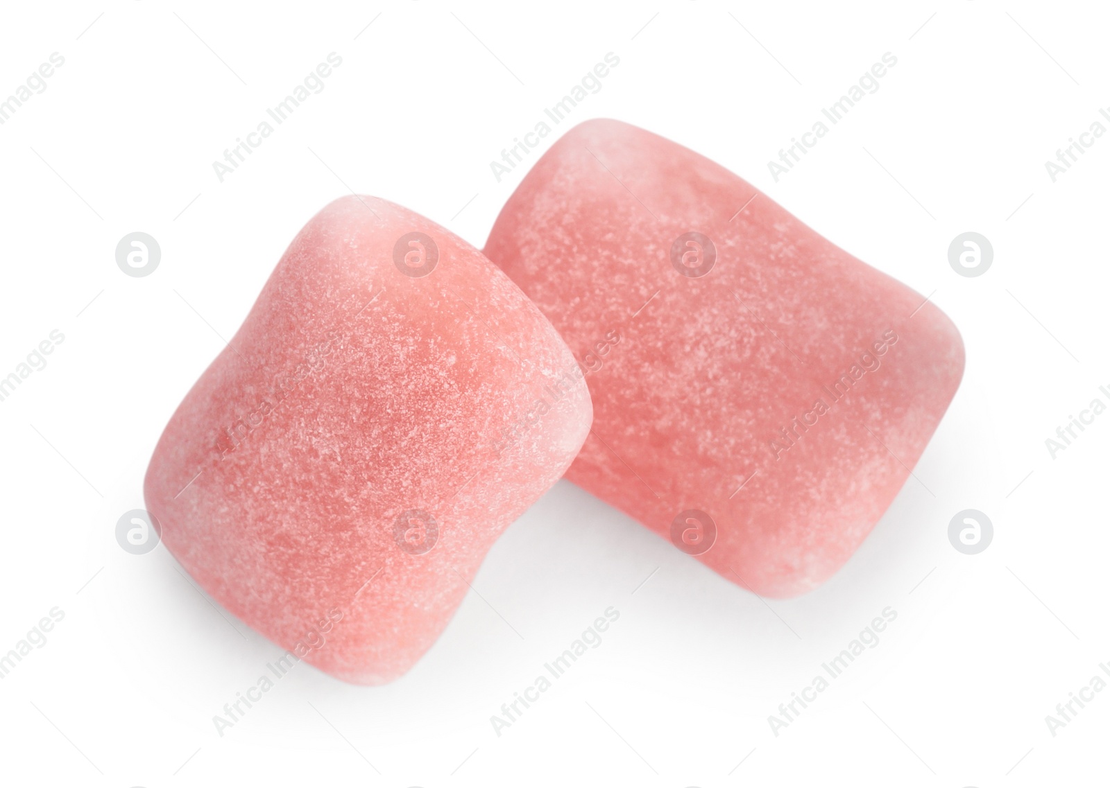 Photo of Tasty sweet chewing gums on white background, top view