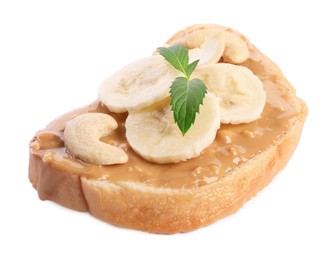 Toast with tasty nut butter, banana slices and cashews isolated on white