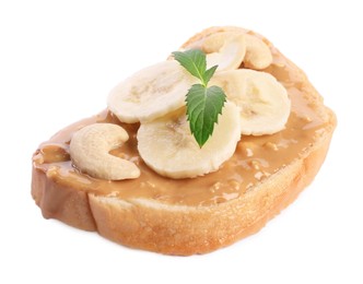 Photo of Toast with tasty nut butter, banana slices and cashews isolated on white