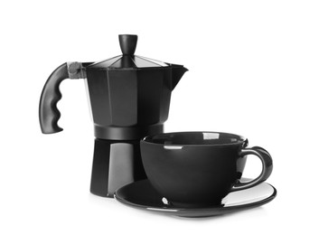 Photo of Moka pot and cup with saucer on white background