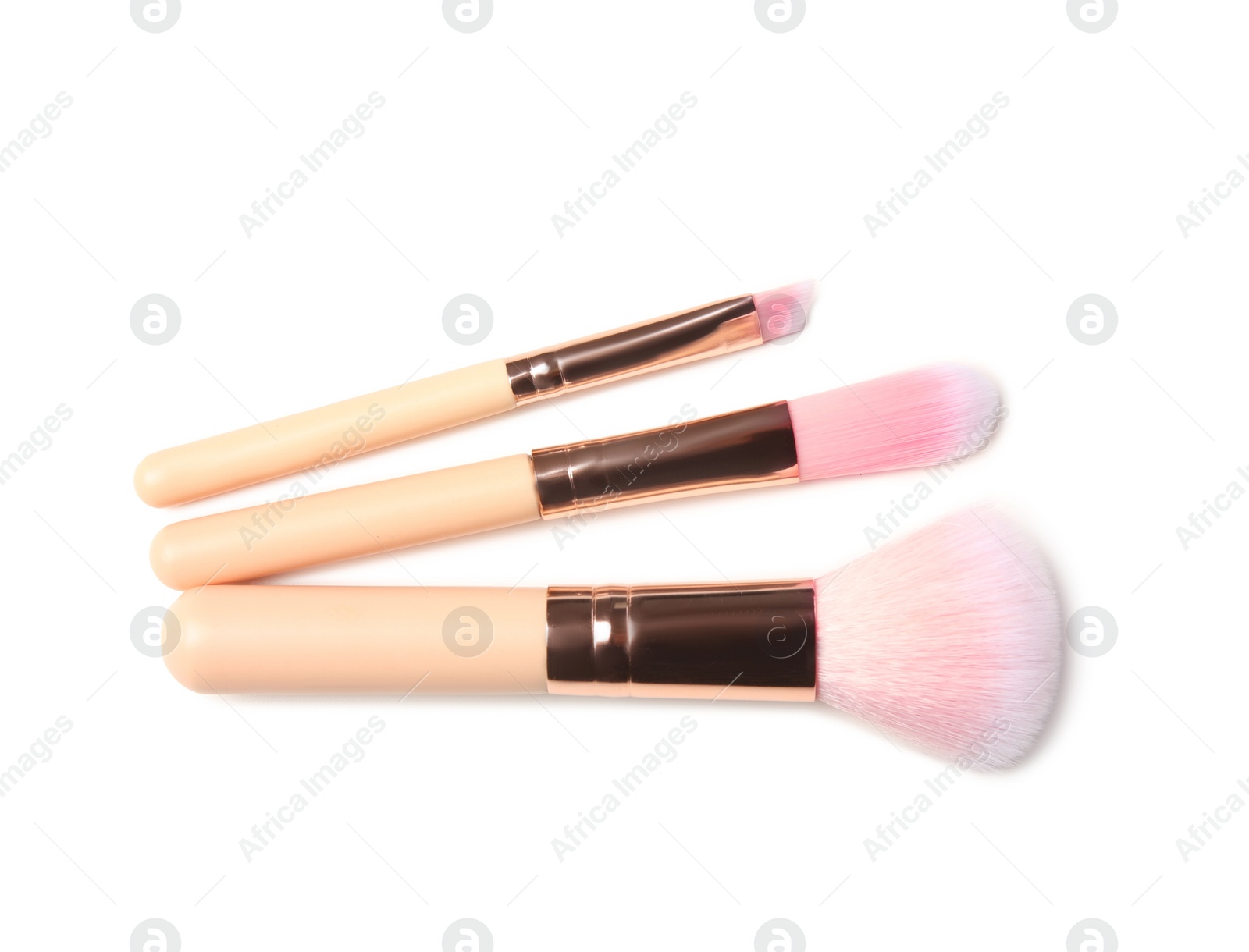 Photo of Makeup brushes of professional artist on white background