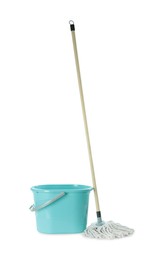 Photo of Mop and plastic bucket on white background. Cleaning supplies