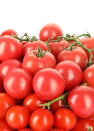 Photo of Many fresh ripe cherry tomatoes with water drops isolated on white