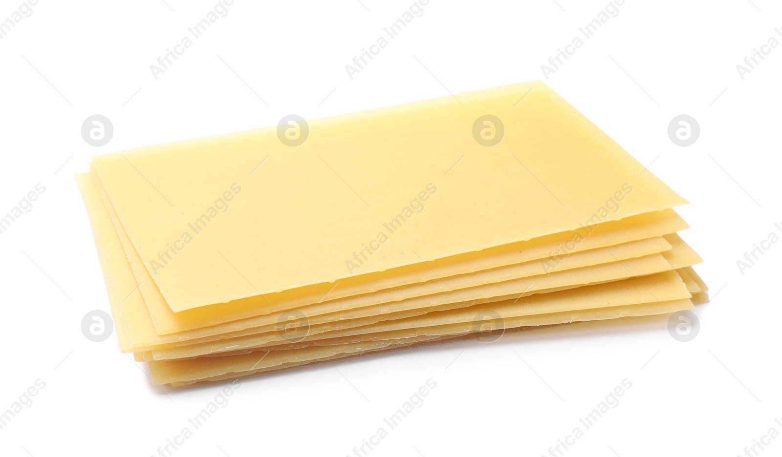 Photo of Stack of uncooked lasagna sheets isolated on white