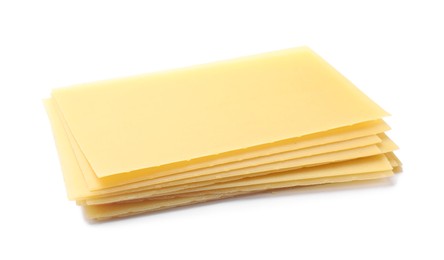 Photo of Stack of uncooked lasagna sheets isolated on white