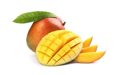 Delicious ripe mangoes on white background. Tropical fruit